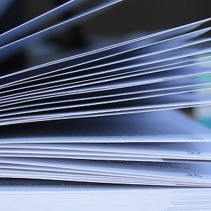 A fanned-out stack of documents