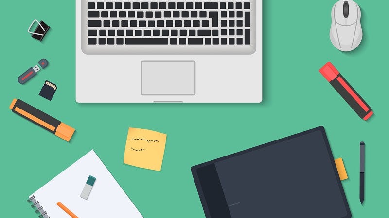 Colorful illustration of laptop and other office items around it