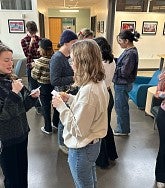 Engaged Journalism students using the 35 Cards facilitation technique to cluster urgent needs