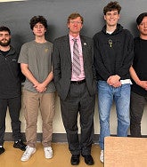 Oakridge city administrator James Cleavenger (center) with the team that proposed the Oakridge Paddle Triathlon.
